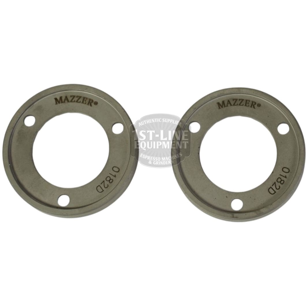 A set of two Mazzer FMA00182D/QQQ 1-phase 58mm flat grinding burrs, each with three holes and a hollow center, are shown side by side on a white background. © 2025 1st-line.com