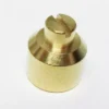 A small, cylindrical brass screw with a flat, slotted head is set on a white background, typically used to secure components such as the Elektra 00042014 Steam/Water Valve Gasket Seat. © 2025 1st-line.com