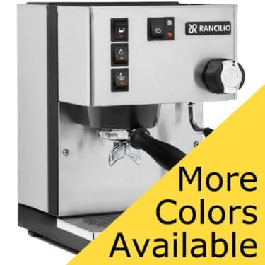 A stainless steel Rancilio Silvia M Espresso Machine with front buttons. A yellow banner in the bottom right corner says, More Colors Available. © 2025 1st-line.com