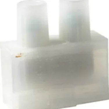 A translucent plastic wire connector compatible with the Elektra 03916035 Socket/Connector—One Pole for Sixties 2 Group (2009-2011), featuring two cylindrical top openings for electrical connections. © 2025 1st-line.com