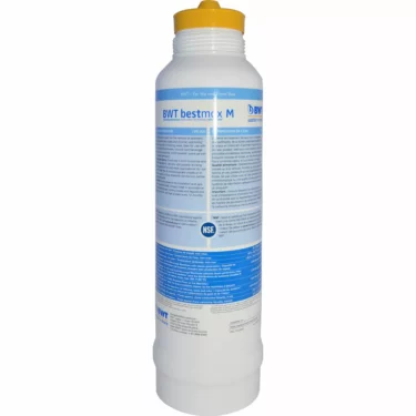 A white BWT Bestmax -M-Cartridge, Single water filter with a yellow cap and front blue and black text labels showing product info and certification logos. © 2025 1st-line.com