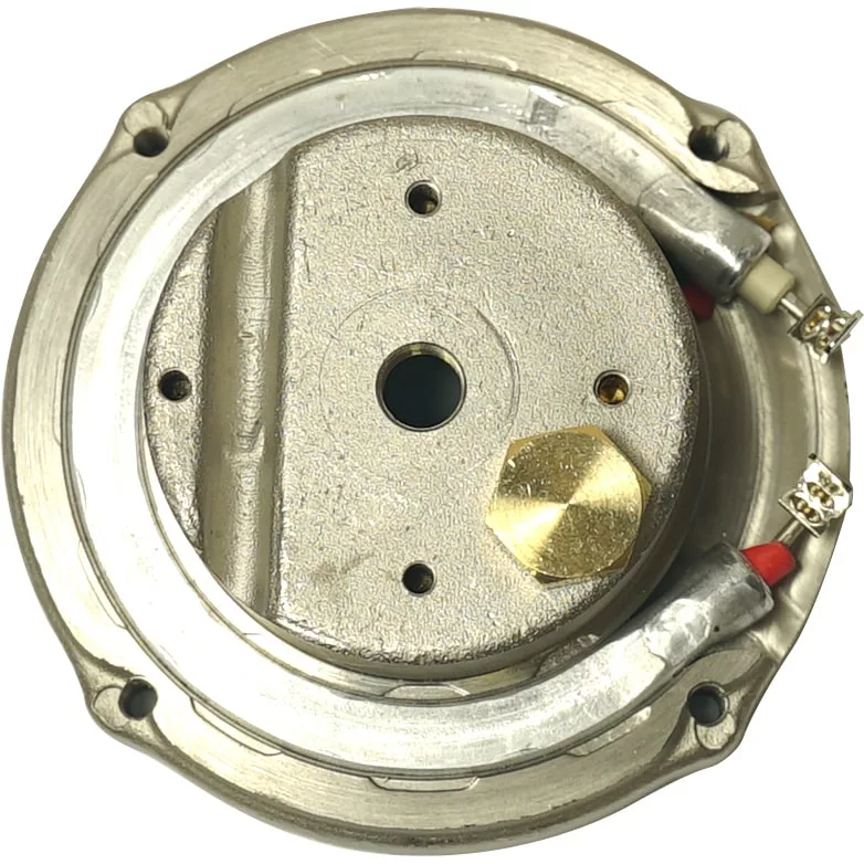 Close-up of the Ascaso I.365N 110V Brass Boiler/Heating Element with a central hole, two small surrounding holes, red-tipped electrical connectors, and a hexagonal brass component on the surface. © 2025 1st-line.com