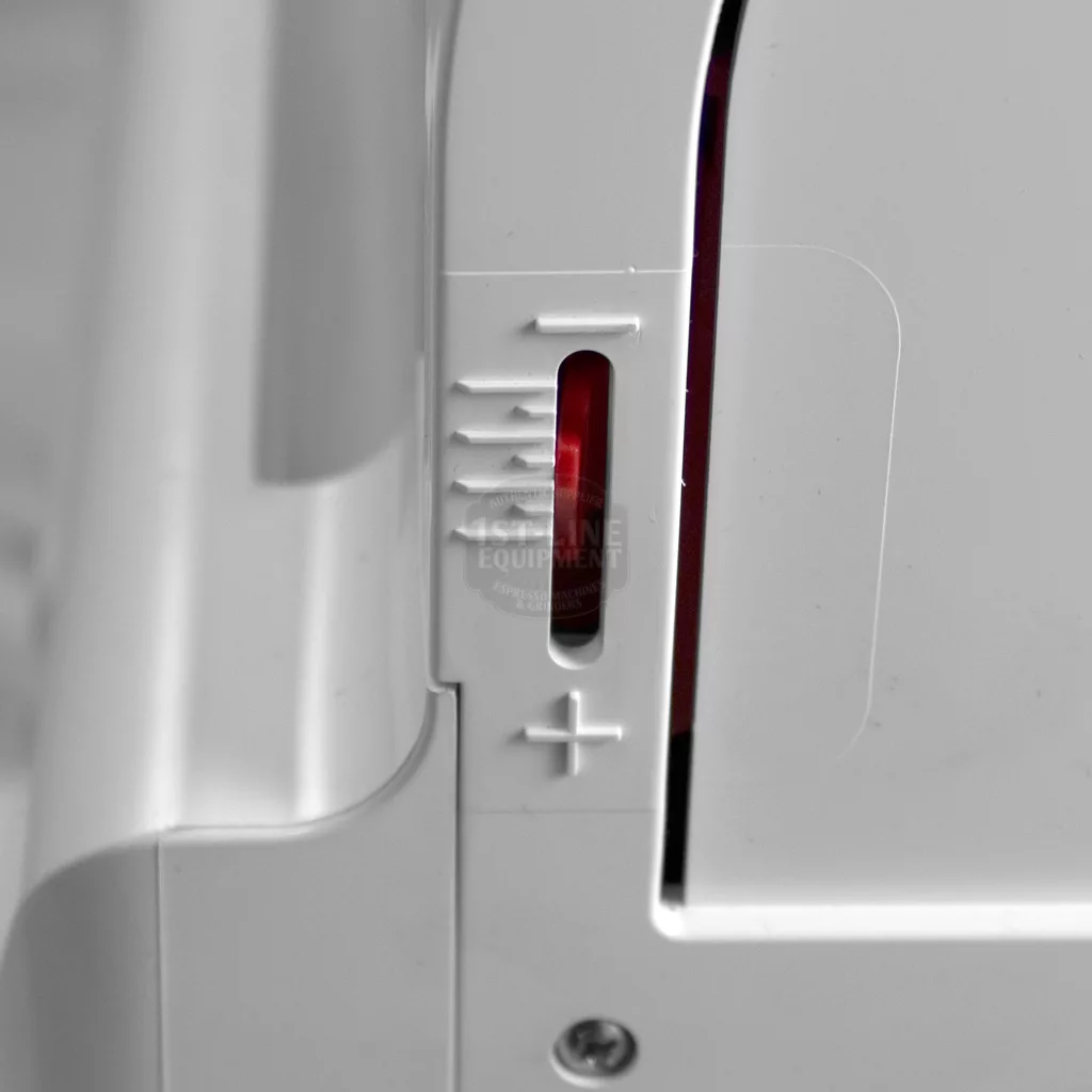 Close-up of the IN STORE PICKUP ONLY - SPM SP1 Commercial Frozen Beverage Dispenser (1 bowl, white), featuring a slider control with plus/minus signs and red indicator—ideal for commercial frozen beverage needs. © 2025 1st-line.com