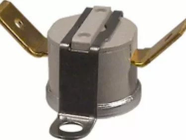 Close-up of the Rancilio 34200055 Steam Thermostat (140) for Rancilio Home Model, showing its metallic cylindrical body, two flat gold-colored terminals, and a base mounting hole. © 2025 1st-line.com