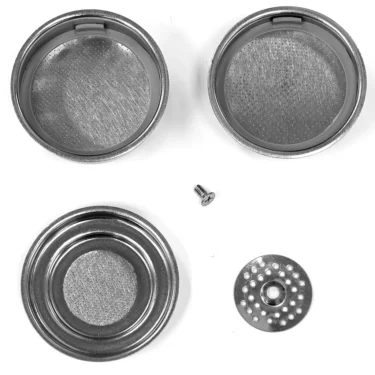 Five metal parts of the Ascaso KIT10 - Supercrema are shown on a white background: two Supercrema filter baskets, a screw, a perforated disk, and a round metal base. © 2025 1st-line.com