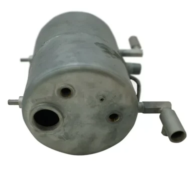 A Ponte Vecchio C1002R Lusso One and Two Group NON-POLISHED Boiler component, cylindrical with multiple circular openings and pipe connectors, is shown from one end against a white background. © 2025 1st-line.com