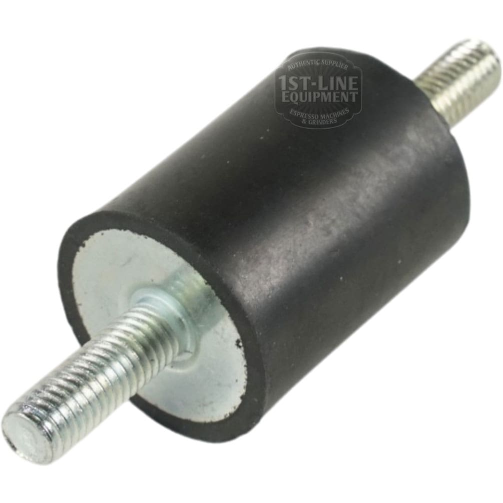 Shown is an Ambiente Espresso Shock Absorbing Rear Foot/Leg for Vesuvius and Vostok 1: a black cylindrical rubber damper with threaded metal studs at both ends, positioned between two circular metal plates on a white background. © 2025 1st-line.com