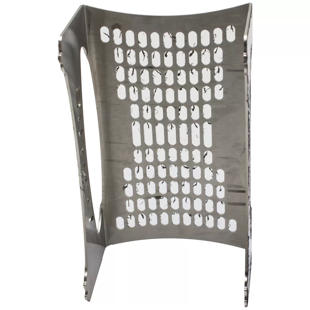 The ACS VEN0038 Drip Tray Stand / Extension features a curved metal sheet with rows of rectangular perforations, making it suitable for industrial or mechanical applications. © 2025 1st-line.com