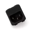 The Ambiente Power Plug Socket/Connector - Ventus is a black, rectangular electrical connector with three metal prongs inside, shown angled against a white background—commonly used in espresso machines and grinders. © 2025 1st-line.com