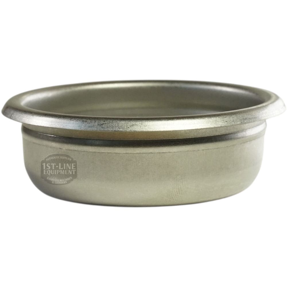 The Bezzera 5471021.01 58mm 2-Cup Filter Basket w/ Run Channel features a flat bottom, slightly outward-flaring rim, and is designed to hold ground coffee in espresso machines. 1st-Line Equipment is faintly visible on its side. © 2025 1st-line.com