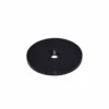 The Caffemotive FMPIA0001X00 Insulating Plate for Bacchi Espresso Machine is a black, flat, circular metal disc with a central hole, displayed against a white background. © 2025 1st-line.com