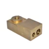 The Didiesse Heating Block is a rectangular brass block with a threaded circular opening on top and two round holes at one end, shown against a plain white background. © 2025 1st-line.com