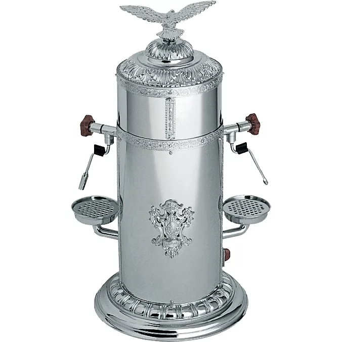 The DISCONTINUED Elektra Belle Epoque 1 Group Espresso Machine is a vintage silver model featuring ornate engravings, side levers, drip trays, and a striking eagle-shaped ornament on top. © 2025 1st-line.com