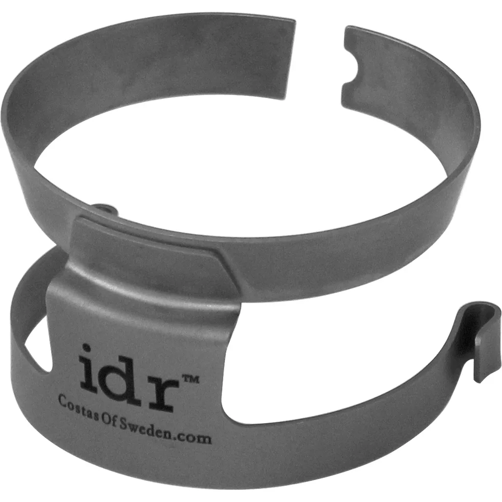 The DISCONTINUED IDR Intelligent Dosing Ring Portafilter Tool is a gray metal accessory with a clasp labeled idr CostasOfSweden.com, designed for functional dosing use. © 2025 1st-line.com