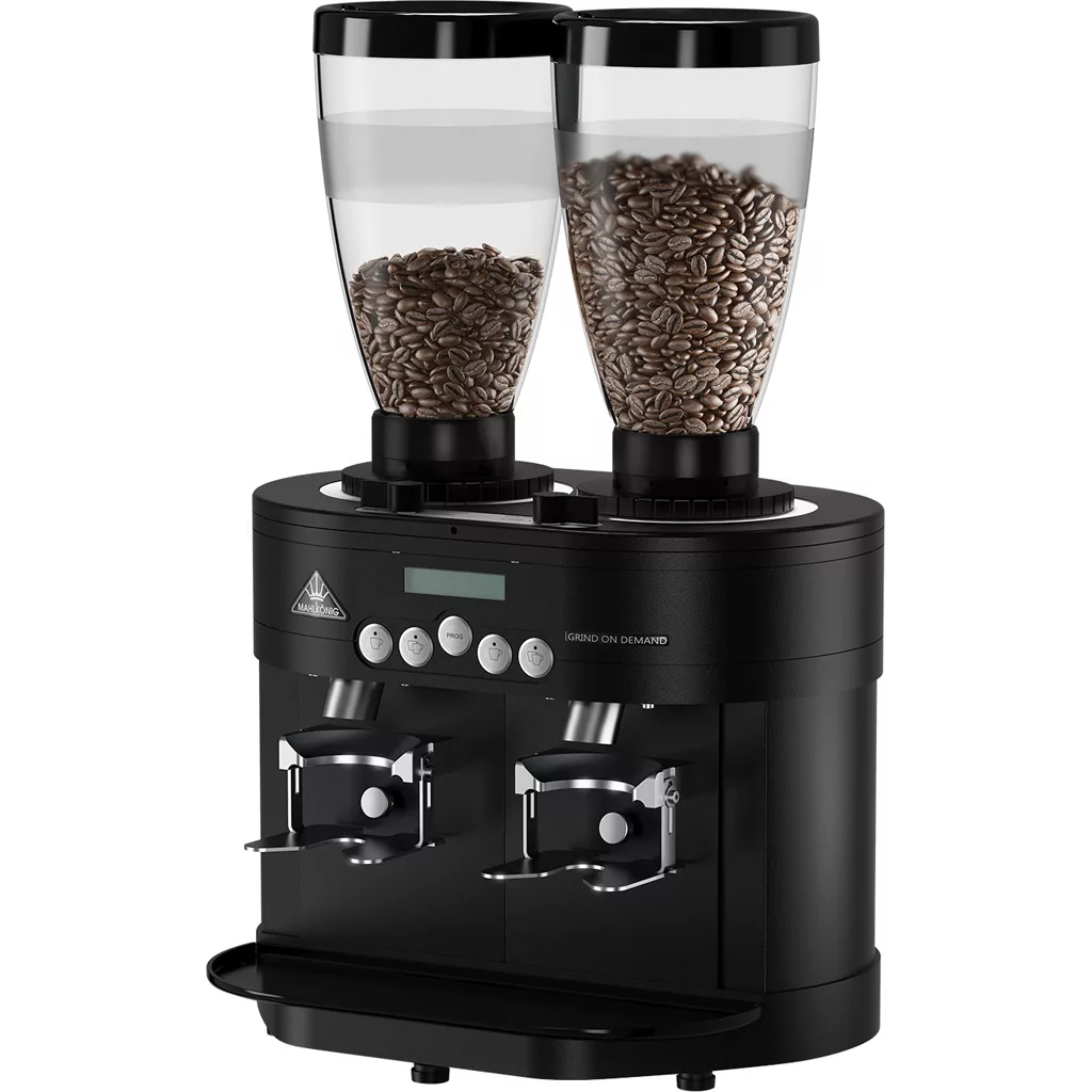 The DISCONTINUED Mahlkonig K30 Twin Commercial Coffee Espresso Grinder features two transparent hoppers, a digital display, and dual ports for grinding beans directly into portafilters—ideal for professional espresso use. © 2025 1st-line.com