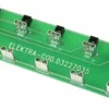The Elektra 03227035 Electronic Card is a green rectangular component labeled ELEKTRA-COD.03227035, featuring six fuse holders and metallic connectors arranged in two rows. © 2025 1st-line.com