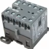 The Elektra 03244035 Electromagnetic Switch for Sixties 2 Group is a black industrial unit with multiple labeled screw terminals, technical markings on the side, and mounting features. © 2025 1st-line.com