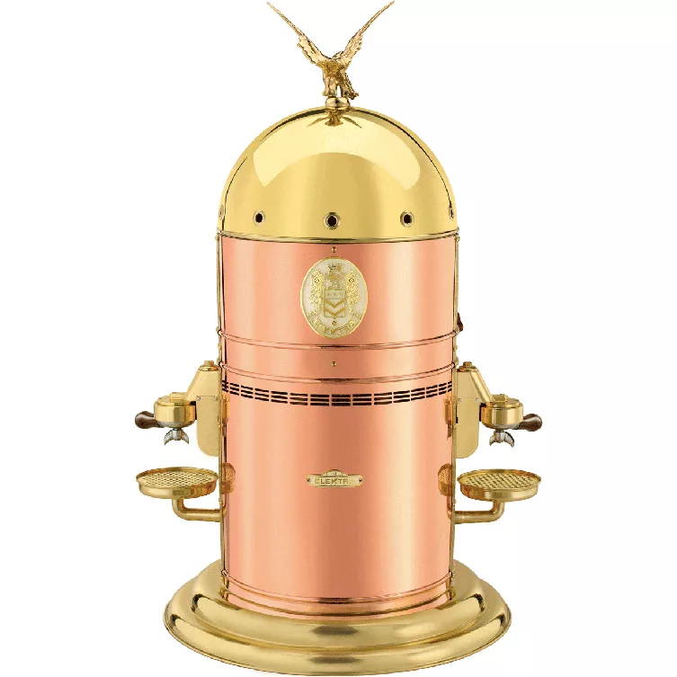The Elektra Belle Epoque 3 Group Commercial Espresso Machine features dual portafilters, side cup trays, a dome-shaped lid, and an eagle ornament, all in a vintage-style copper and gold finish. © 2025 1st-line.com