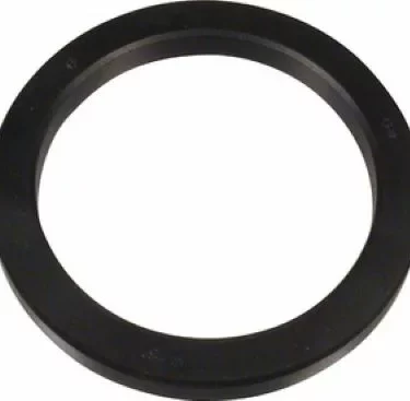 The Futurmat Portafilter Gasket - Futurmat FS176 is a black, flat, circular washer with a hollow center, shown from above on a white background. © 2025 1st-line.com