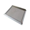 The Isomac 000306 Zaffiro Drip Tray Cover is a rectangular, tightly woven metal mesh screen with a white frame, shown slightly angled on a white background. It’s designed specifically for Isomac espresso machines. © 2025 1st-line.com