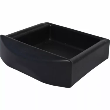 The La Nuova Era NE447N Plastic Drip Tray is a black, rectangular tray with curved edges and a raised front lip, ideal for holding or organizing small items. © 2025 1st-line.com