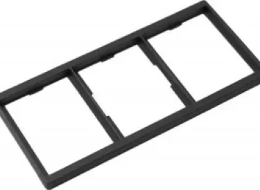 The Lelit MC021 Control Panel Gasket is a rectangular black plastic frame with three evenly spaced square openings, typically used as a switch or outlet cover plate. © 2025 1st-line.com