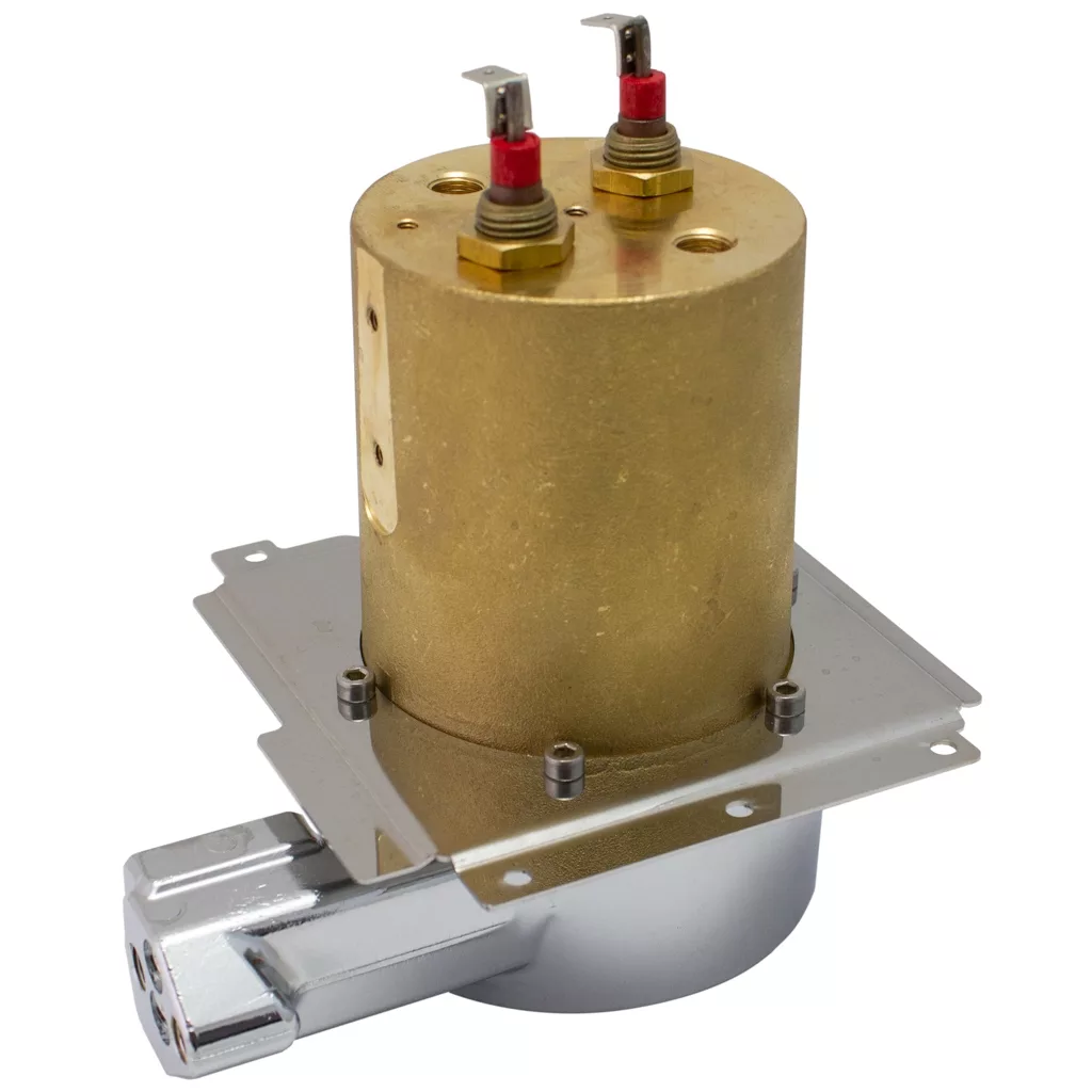 The Lelit MC752/110 Coffee Boiler Assembly is a brass and metal electrical component with two red-tipped terminals on a silver base plate, designed as an essential coffee machine part for the Lelit MC752/110 model. © 2025 1st-line.com