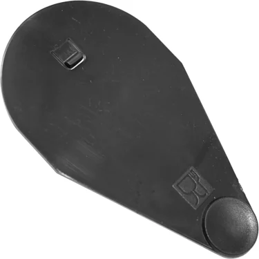 The Macap Bean Hopper Stopper - M7 is a black plastic, wedge-shaped doorstop with a small rectangular grip and raised circle at the pointed end; minor surface scratches are visible. © 2025 1st-line.com
