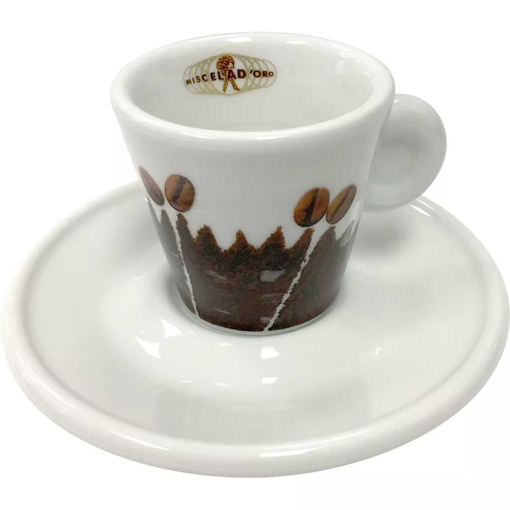 The Miscela dOro Espresso Cup & Saucer - 2 fl oz features a white ceramic cup with a coffee bean design, Miscela dOro inside the rim, and a matching saucer—ideal for any espresso enthusiast. © 2025 1st-line.com