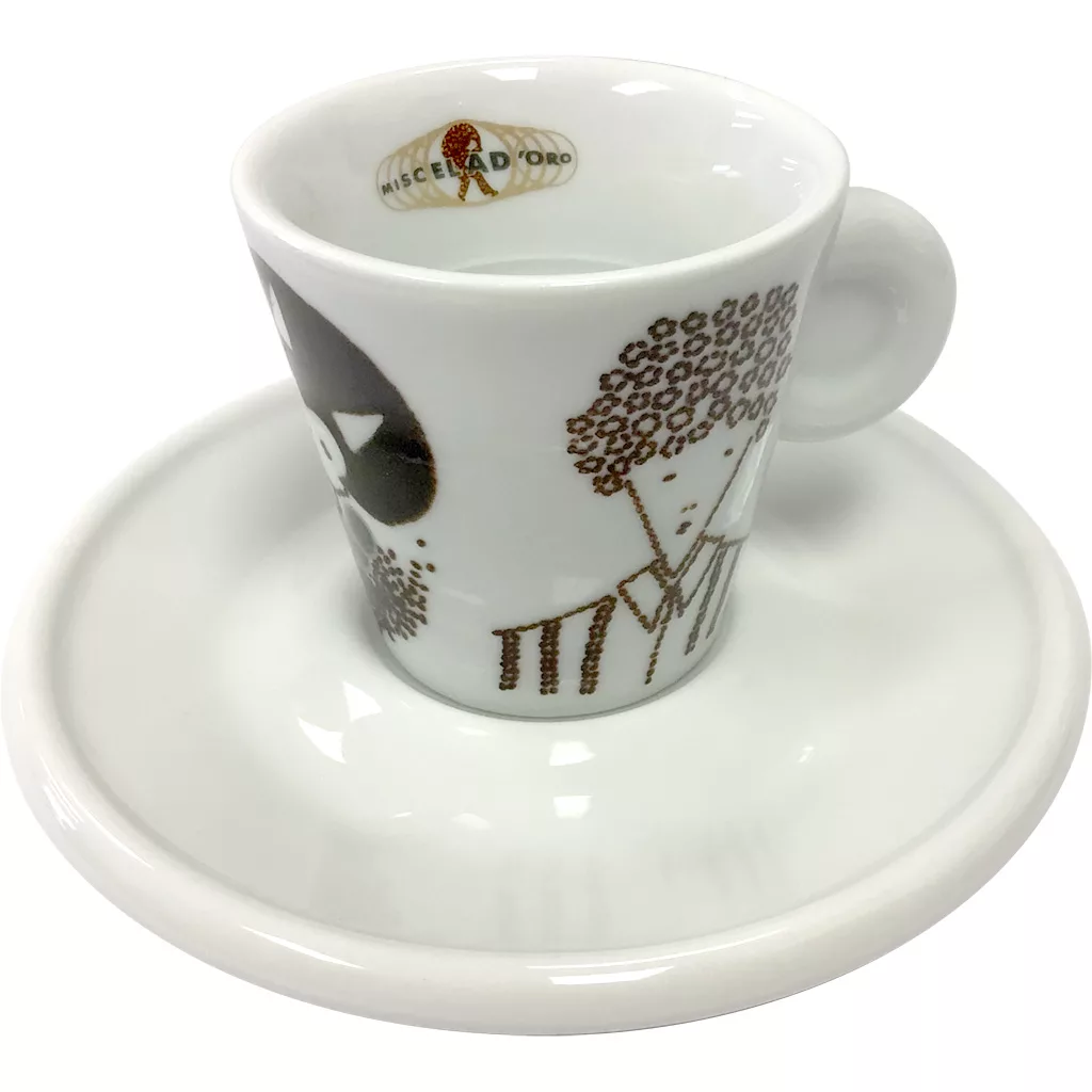The Miscela dOro Espresso Cup & Saucer - 2 fl oz is a white cup with handle on a saucer, featuring a brown illustration of a curly-haired person in a striped shirt and the Miscela dOro oval logo inside the rim. © 2025 1st-line.com