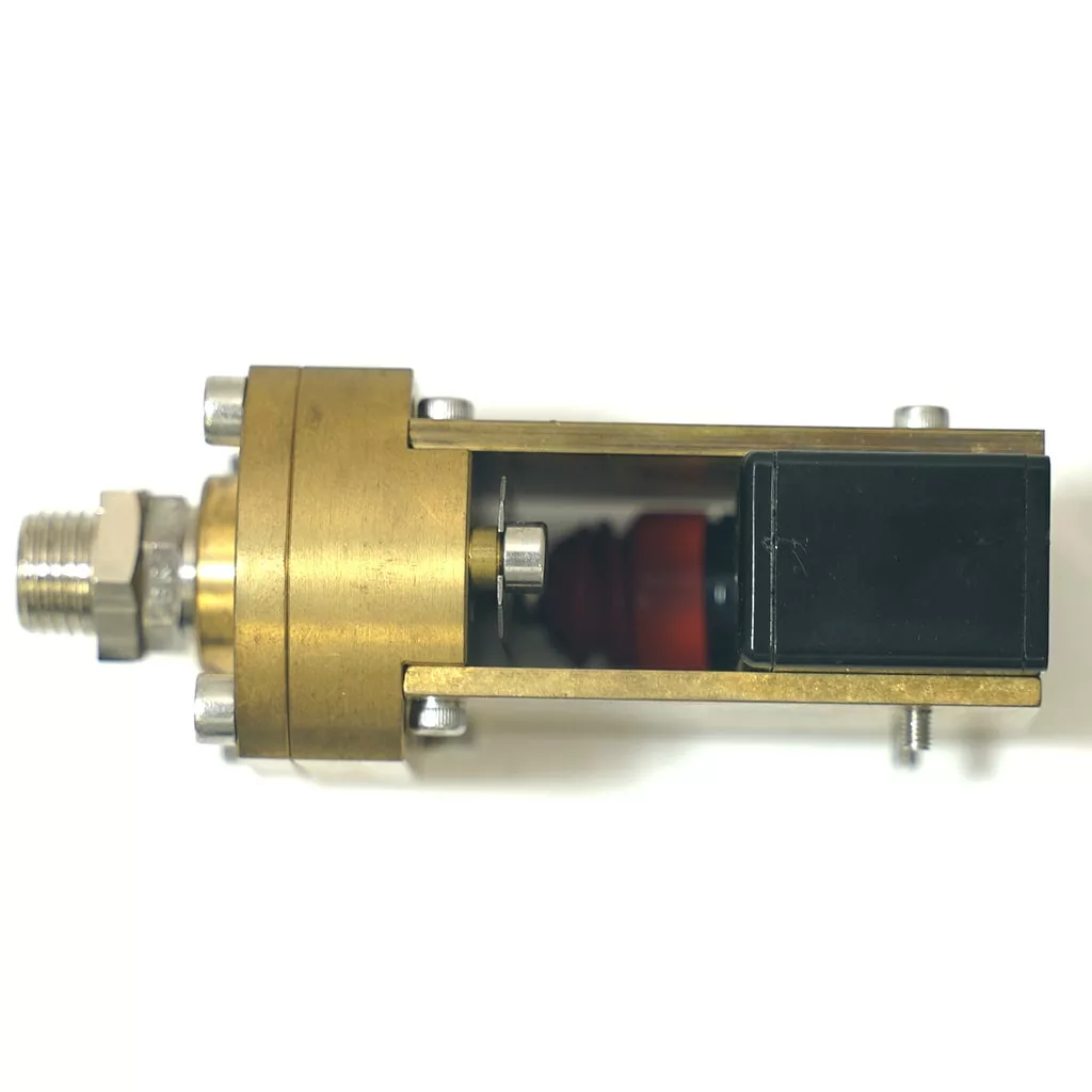 The OEM Olympia Pressurstat, a brass and metal mechanical device with exposed components including a black rectangular part and threaded fitting, is shown side view against a white background. © 2025 1st-line.com