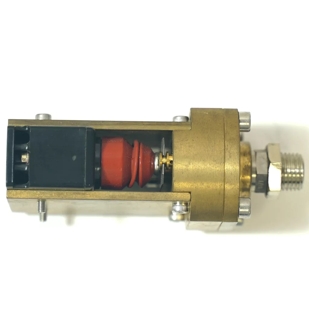 The OEM Olympia Pressurstat is a brass and metal mechanical component with a black rectangular part, red cylindrical section, screws, and a threaded fitting—ideal for Olympia espresso machines; shown on a white background. © 2025 1st-line.com