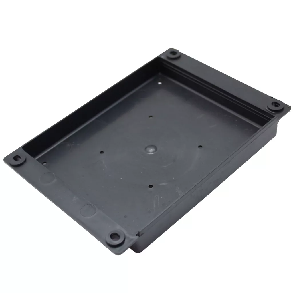 The Pasquini Cover - Bottom - Plastic - Tav2.15 For Livia 90 is a rectangular black enclosure with four corner screw holes and a flat base, ideal as a replacement cover for Livia 90 or Tav2.15 espresso machines. © 2025 1st-line.com