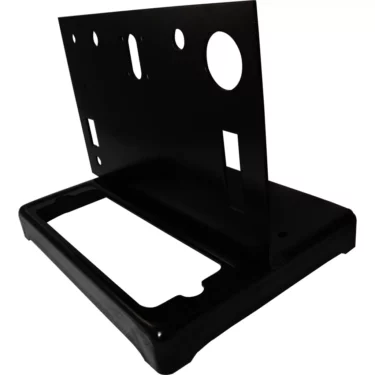 The Ponte Vecchio Frame - Lusso 1G is an upright black enclosure panel with multiple cutouts for switches, buttons, and connectors on a rectangular base, shown against a white background. © 2025 1st-line.com