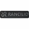 The Rancilio 42200121 Nameplate Logo is a black rectangular badge featuring the Rancilio nameplate and stylized silver emblem embossed on its surface. © 2025 1st-line.com