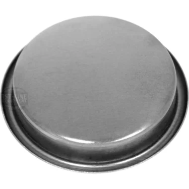 The Universal 58mm Blind Filter Basket is a round, flat silver cap with a slightly raised center and thin outer rim, displayed against a white background. © 2025 1st-line.com