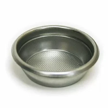 The VBM FILT2TB 2-Cup Filter Basket is a metal espresso portafilter basket with a perforated bottom for filtering coffee grounds, shown on a plain white background. © 2025 1st-line.com