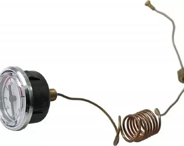 The VBM MANMDOE40016 Brew Pressure Gauge features a round analog dial and a long coiled metal sensor tube with threaded and VBM-specific fittings, shown isolated on a white background. © 2025 1st-line.com