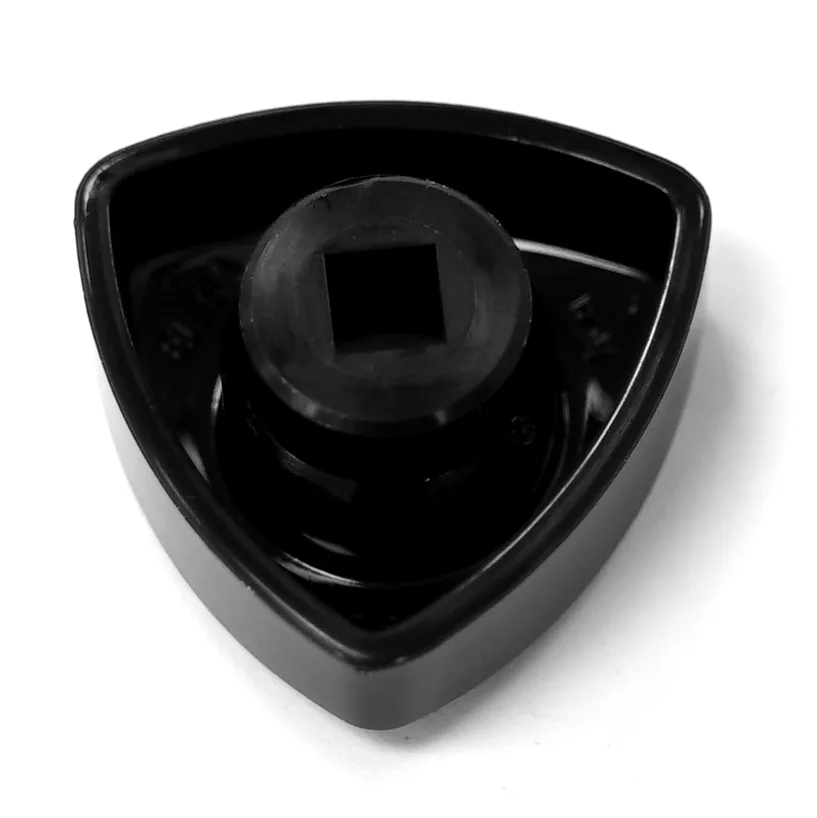 The VBM MANPRUSC Steam/Water Rotary Knob is a black, triangular adapter with a central square opening for use with a socket wrench, making oil filter removal easy. © 2025 1st-line.com