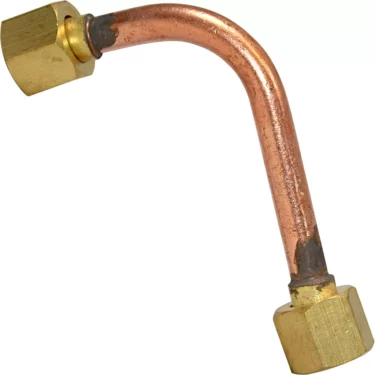 The VBM TUBIP880 Tube Connection from Boiler to Steam Tap is a bent copper pipe with brass hexagonal fittings on both ends, designed for plumbing or HVAC use and pictured against a white background. © 2025 1st-line.com