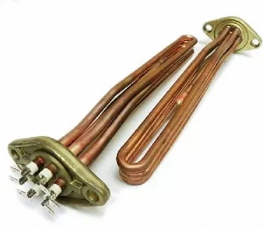 Two copper-colored Fiorenzato A2100031 Boiler Elements with Flange 230V 3500W for 2 GROUPS, featuring metal bases and electrical terminals, lie side by side on a white background. © 2025 1st-line.com