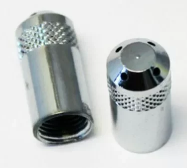 Two Rancilio 23119028 Steam Wand Tips (4-hole, for Rancilio commercial models) are shown on a white surface: one upright and one on its side showing the threaded interior, both with knurled grips and shiny metallic finish. © 2025 1st-line.com