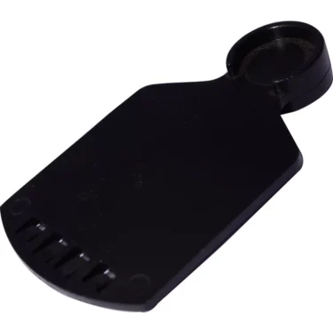 A black plastic keycap puller with a flat body, rounded handle, and four prongs removes keyboard keycaps easily—just as the Mazzer Bean Hopper Stopper for Kony makes coffee prep simple. © 2025 1st-line.com