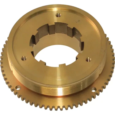 A close-up of the Ascaso MI.222 Upper Burr Holder - I-1, I-Steel flat shows its brass gear with evenly spaced teeth, multiple holes, and grooves, designed for mechanical or industrial use. © 2025 1st-line.com