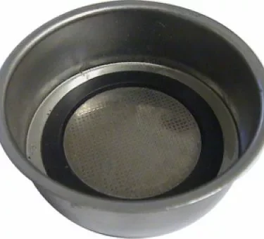 A close-up of the Solis 521.02 1-Cup Double Wall Pressurized Filter Basket/Cup featuring a fine mesh screen, designed for use in espresso machines. © 2025 1st-line.com