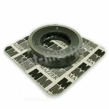 A metal ball bearing rests on a white square paper printed with Mazzer’s name and logo, mirroring the precision of Mazzer OEM FMA00033M/QQQ 1-Phase 64mm Flat Grinding Burrs (set of 2) and their quality components. © 2025 1st-line.com