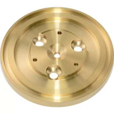 A round, gold-colored metal disk with a central conical indentation and precise holes, the Ascaso I..829 Shower Holder Capsule is a component for boiler versions only. © 2025 1st-line.com