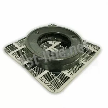 A set of Mazzer OEM FMA00151A/QQQ 1-Phase 83mm Flat Grinding Burrs sits on top of a square paper with the Mazzer logo and pattern, viewed from an angle. © 2025 1st-line.com