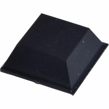 A single Bezzera 7474212 Adhesive Foot/Leg with a flat top and sloped sides, set against a plain white background—perfect for enhancing stability on your Bezzera machine. © 2025 1st-line.com