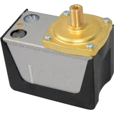 A VBM ELETPRE Sirai Pressurestat for VBM Domobar Super HX featuring a rectangular black and silver body, gold top with four screws, and a threaded connector at the top center. © 2025 1st-line.com